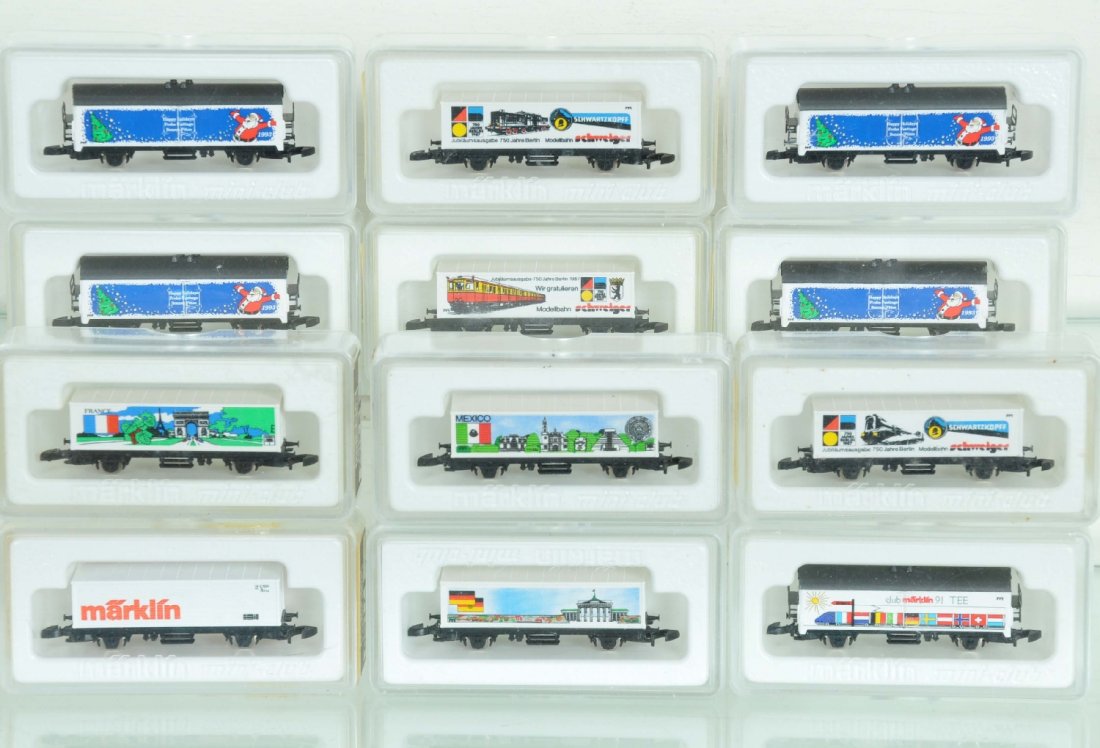 12 Marklin Z Gauge Containers & Reefer Cars: Includes 8615-037; 2558A; 8600 FRE; 8615-035; 2512A; 2521A; 8615-034; 4 #2121A Christmas; 8617 Marklin. All appear like new with boxes, some labels replaced, C9-10