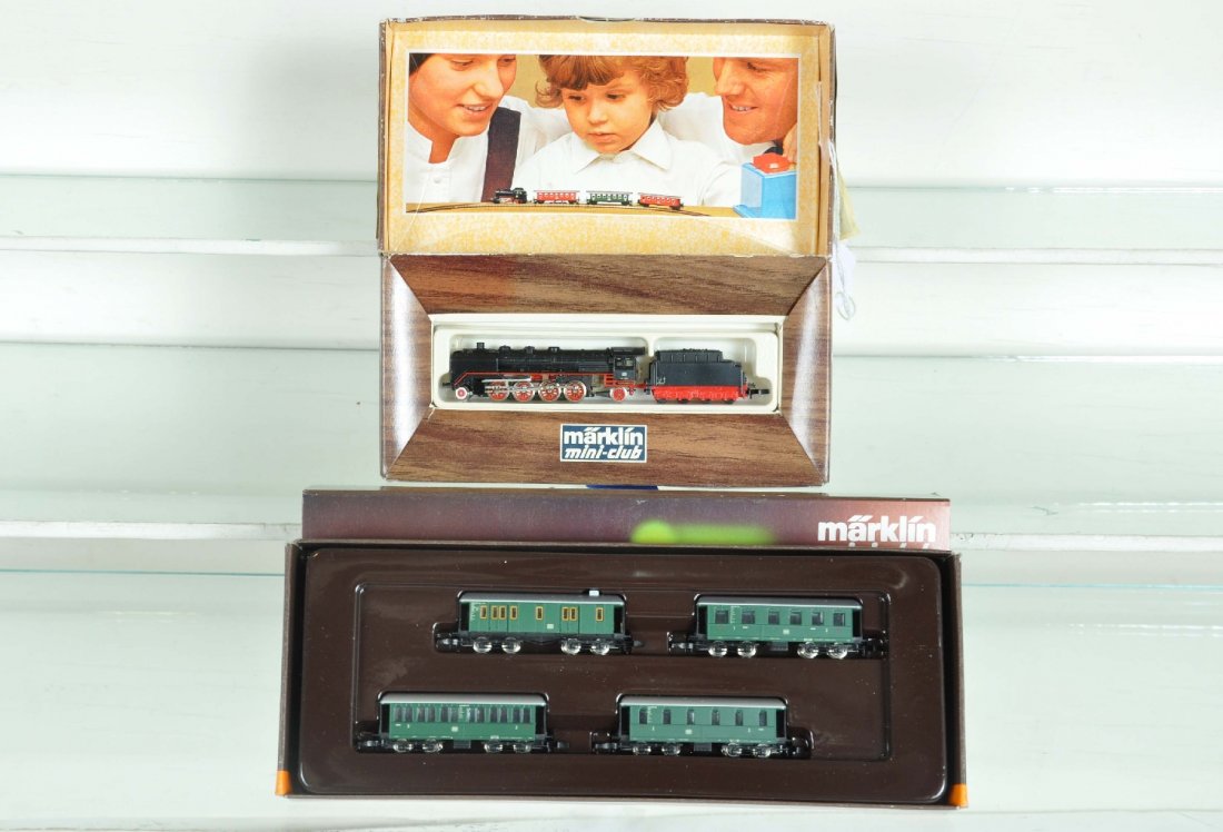 Marklin Z Gauge Steam Passenger Set: Includes an 8827 2-8-2 steam loco, box shows light wear; 8768 Langenschwalbacher 4-car passenger set. All otherwise appear like new with boxes, C9-10