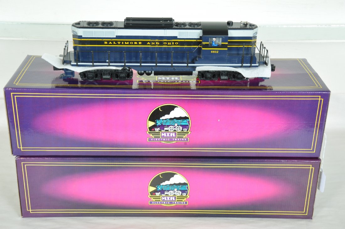 MTH 6602 & 6604 B&O GP9 AA Diesels: Nice dual motor diesels with ProtoSounds. They have their boxes. Perfect paint and trim. Wheels show light to moderate run time. C8
