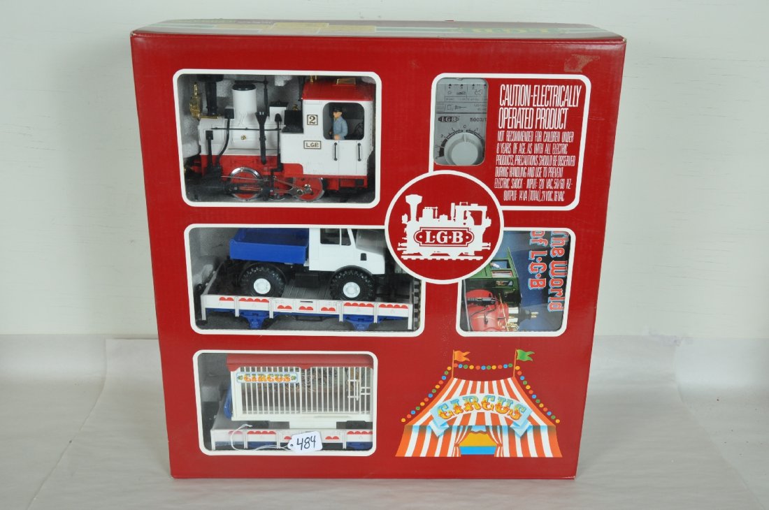 LGB 21988 G Gauge Circus Set: Includes an 0-4-0 steam loco; flat with truck; cage wagon, figures, track & transformer. It has its paperwork & setbox. Perfect paint and trim. Wheels appear test track run. C9