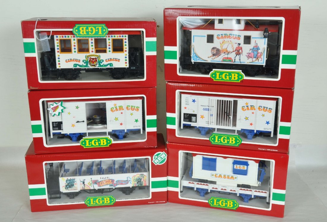 6 LGB G Gauge Circus Cars: Includes 4036 animal wagon; 4037 flat with ticket office; 3125 sight seeing car; 4136S wagon with sounds; 3036 circus coach; 4165 caboose. All have nice boxes. Perfect paint and trim. Wheels appear te