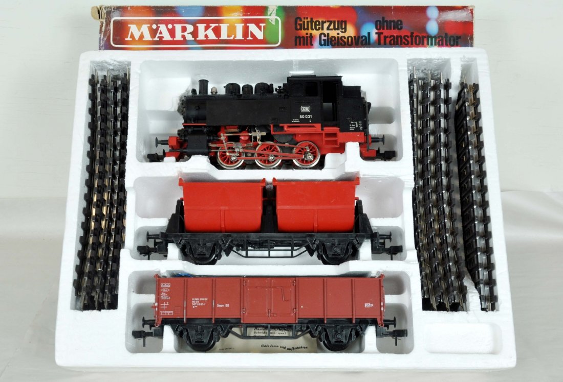 Marklin 5500 Ga 1 Steam Freight Set: G Gauge. Includes an 80031 0-6-0 tank loco; double tipple car; open ballast with track. It has a nice set box. Perfect paint and trim. Wheels show light to moderate run time. C8