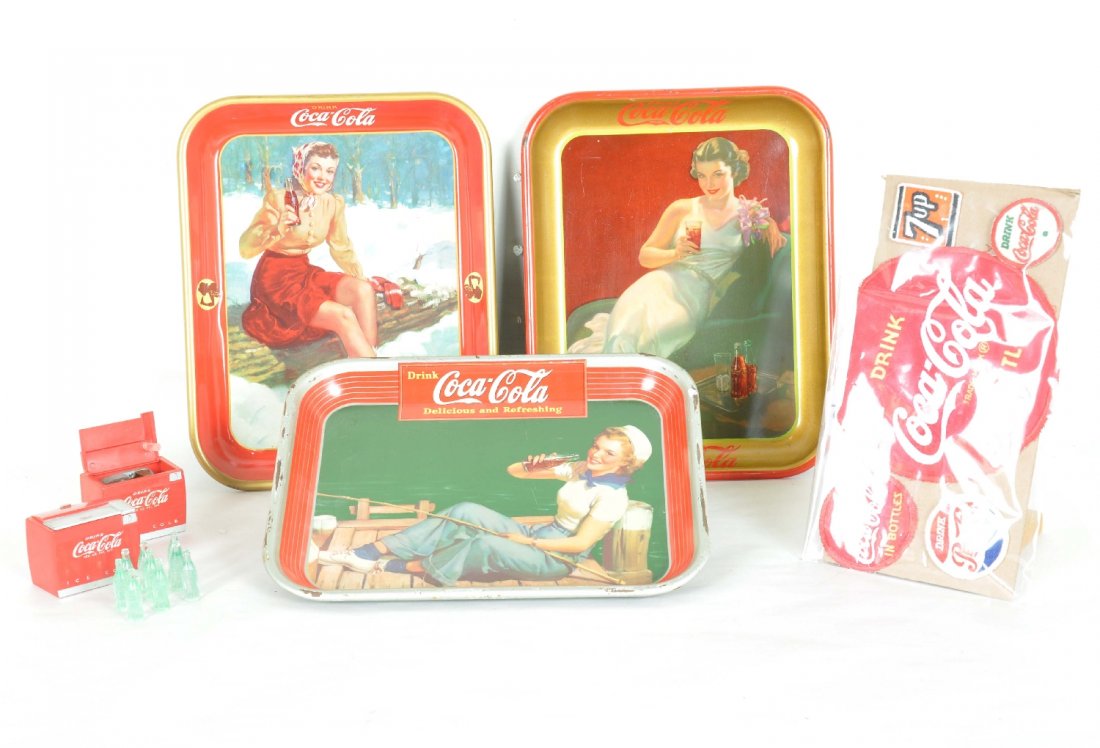 6Pc Vintage Coca-Cola Advertizing Lot: Includes a 1936 tray, back is C5, front C7; 1940 tray, C6; 1941 tray, C7; 3 Coca-Cola uniform patches; 1 7-up & a Pepsi-Cola; Plus a hard plastic Coke dispenser music box and version with bottles insi
