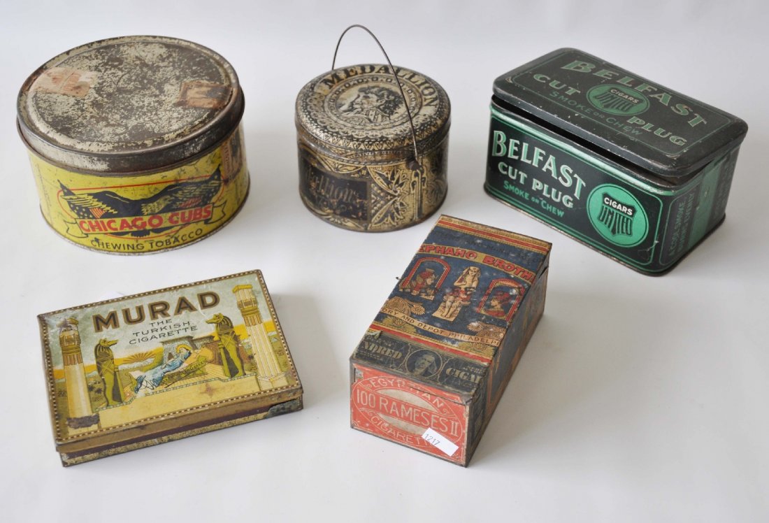 5 Vintage Tobacco Tins: Includes a scarce 6" Chicago Cubs(Baseball) tobacco tin; Unusual Stephano Brothers, Philadelphia; Mural Cigarettes with wonderful Egyptian image; Bellfast cut plug & Medallion. They show moderate wear