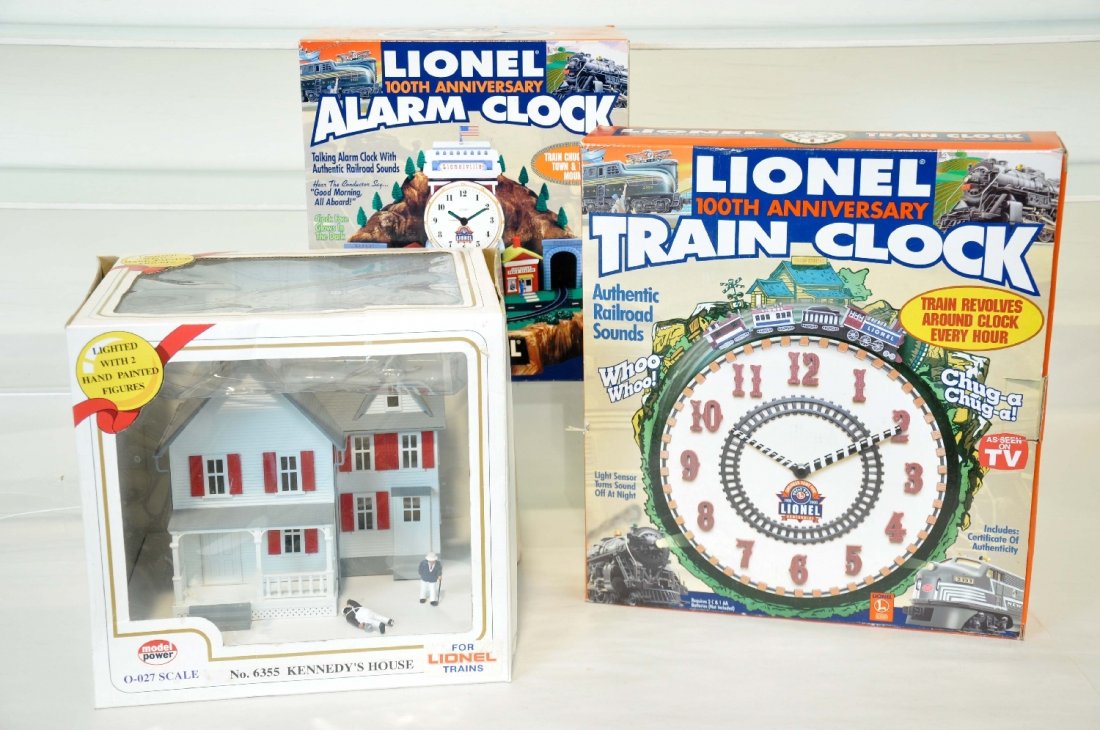 3 O gauge accessories: Includes a Lionel 7401 animated clock; 7183 Lionel clock; Model Power 6355 Kennedy's House. All show light use with boxes, C8