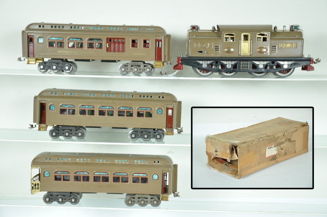 4pc Lionel 402 Passenger Set: St. Gauge. Includes an early 402 dual motor electric. It is clean, rewired and ready to run with a loose coupler. It shows moderate playwear, rough ob, C6; 419 combine; 418 Pullman, missing 1 roof scr