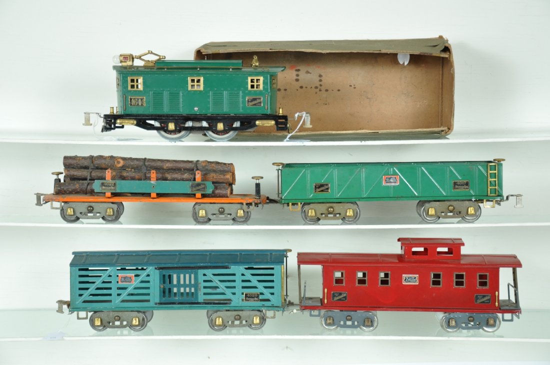 5Pc American Flyer 4644 Freight Set: St. Gauge. Includes a 4644 boxcab electric, rewheeled & rewired, rough ob top only; 4017 sand car; 4022 machine car, added load; 4020 stock car; restored 4021 caboose. Otherwise all show light to mode