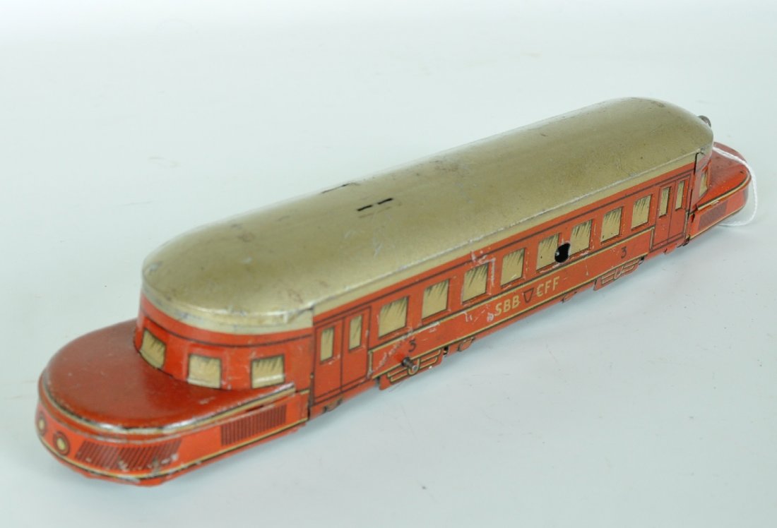 Karl Bub Swiss Railcar: Litho Tin, 11" long, mechanism is functional with start/stop. SBB/CFF Swiss markings. Flanged wheels, but fixed position turning for floor operation. Marked, "Made in Germany, Foreign". It shows moder