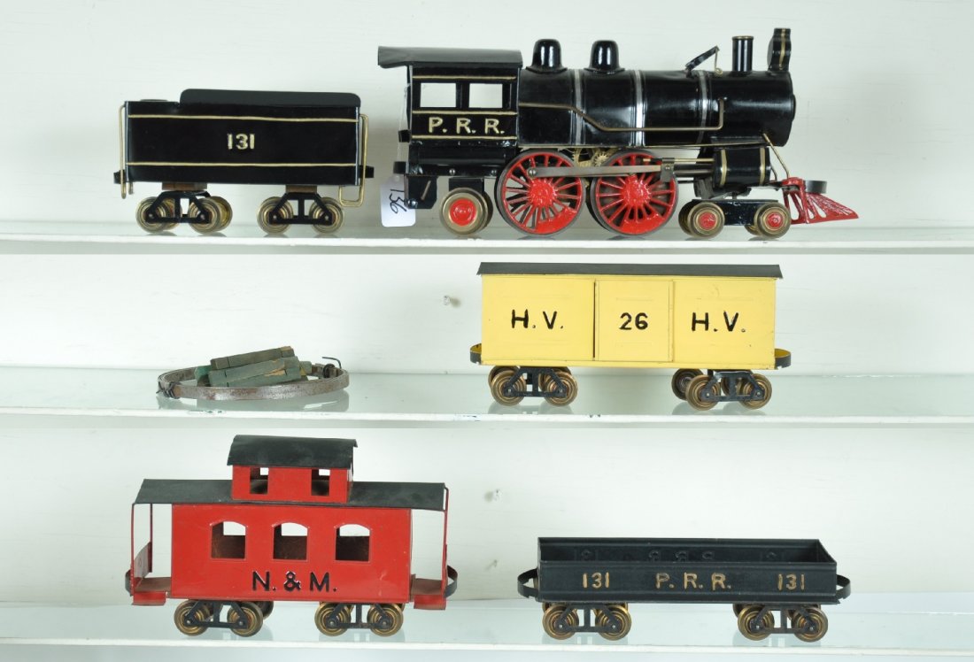 Restored Carlisle & Finch Freight Set: 2 Gauge. Circa 1912. Includes a scarce #34 4-4-2 PRR Atlantic steam loco, bell harp loose, missing bell, 23" over-all with tender, cab roof shows dents; 131 tender; 26 HV boxcar; 131 gondola & N&M cab