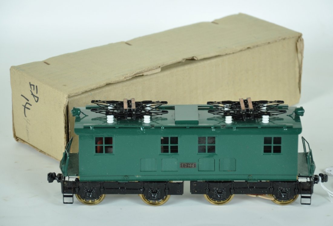 Boxed KTM O Brass Boxcab Electric Loco: Japanese domestic production. Nice factory painted 10" BOBO 0-4-4-0 3-rail loco. Plates read ED144. It is test run with box, clean & shiny, C9