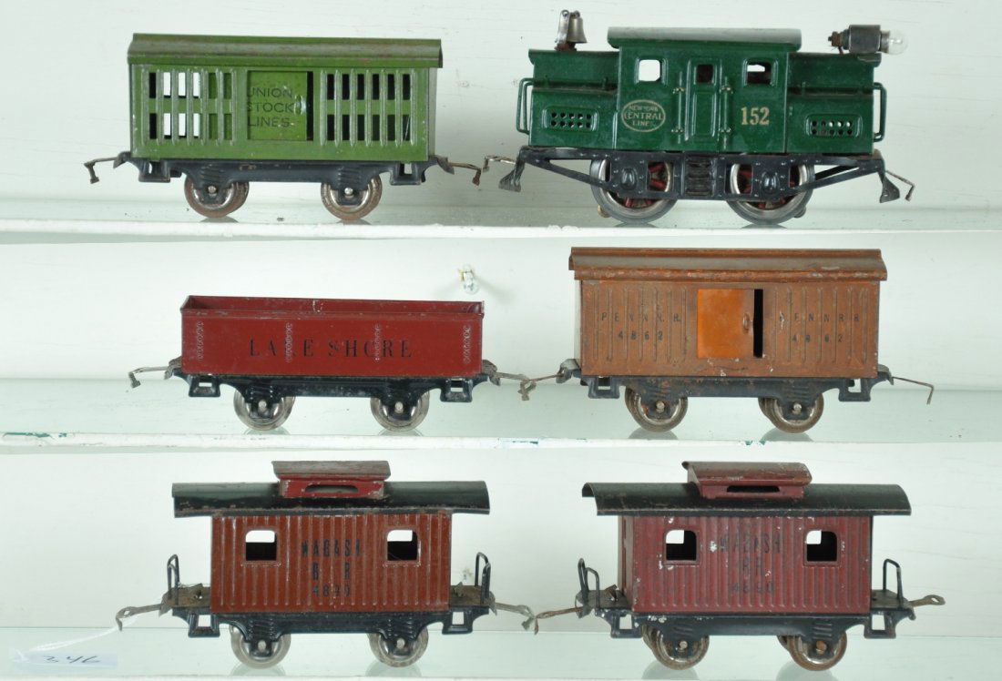 6Pc Early Lionel Train Set: Includes a restored 152 center cab electric; 901 Lake Shore gondola, C7; 800 boxcar; 803 stock car; brown & maroon 801 cabooses. All have dark finish, may be soiling and show moderate playwear, otherw