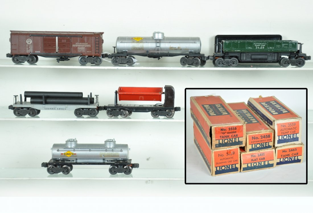 6 Boxed Early Lionel Freight Cars: Includes a 2458 PRR boxcar; 3459 green coal dump with bin; 2555 Sunoco tank car, decals 40%; 2411 flat with repro pipes; 3559 tipple dump; 2465 Sunoco tank. All show moderate playwear with boxes, some