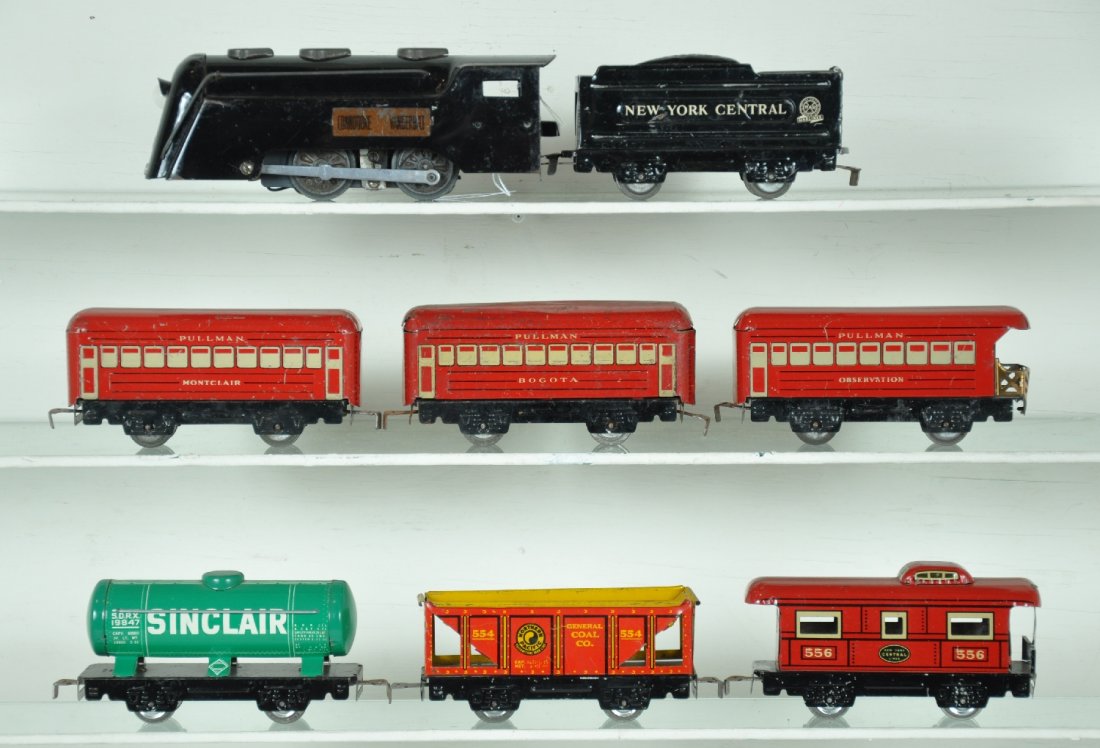8Pc Marx Freight/ Passenger Set: Nice postwar set with CV loco with wedge tender; Montclair Pullman; Bogota Pullman, dented; observation, cars are C5; hopper, tank car & caboose, otherwise show light to moderate playwear, C6-7