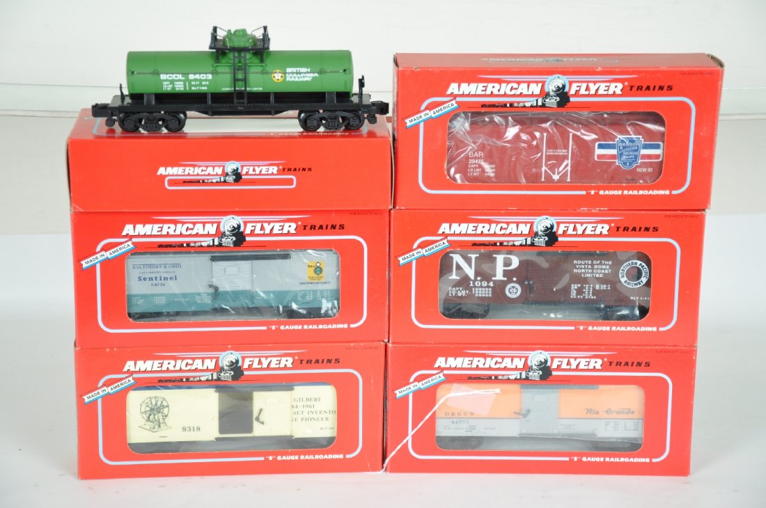 6 Lionel-American Flyer Freight Cars: S Gauge. Includes 48318 Gilbert boxcar; 48403 BC tank car; 48326 Sentinel boxcar; 48485 NASG NP boxcar; 48204 RG boxcar; 48316 B&A reefer. All appear unrun with boxes, C9-10
