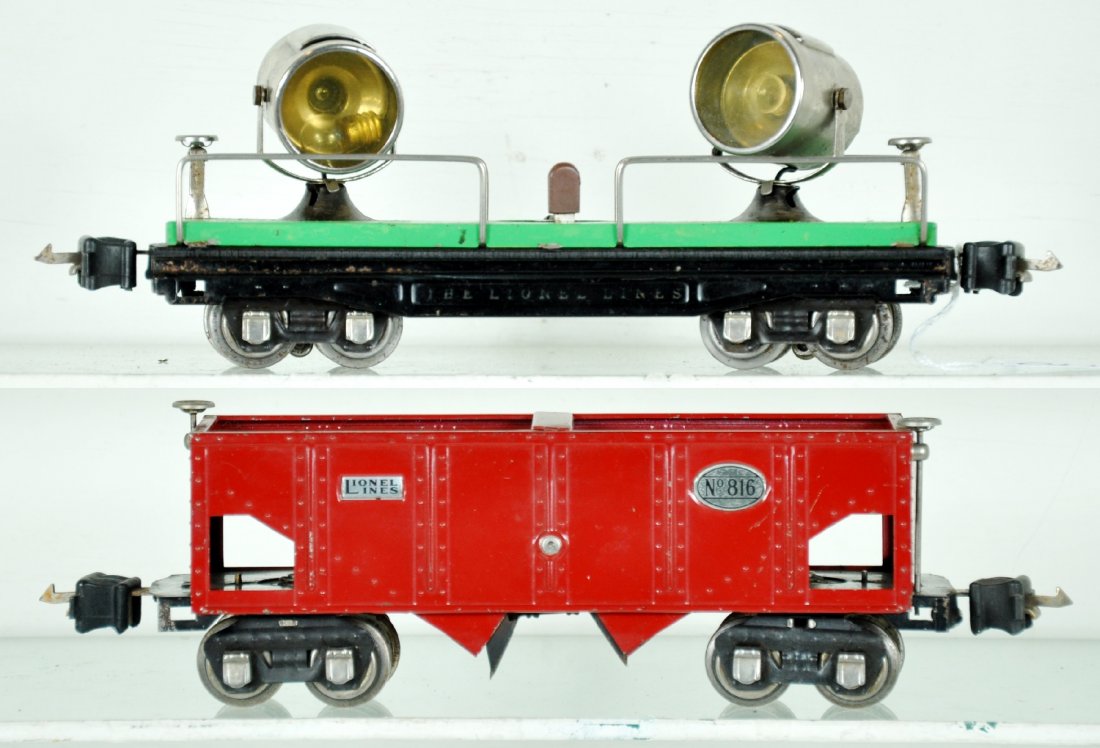 Clean Lionel 816 & 820 Freight Cars: Includes an 816 hopper, cherry red version; 820 searchlight car. Both have manual box couplers, are clean & shiny, showing moderate playwear, C6+