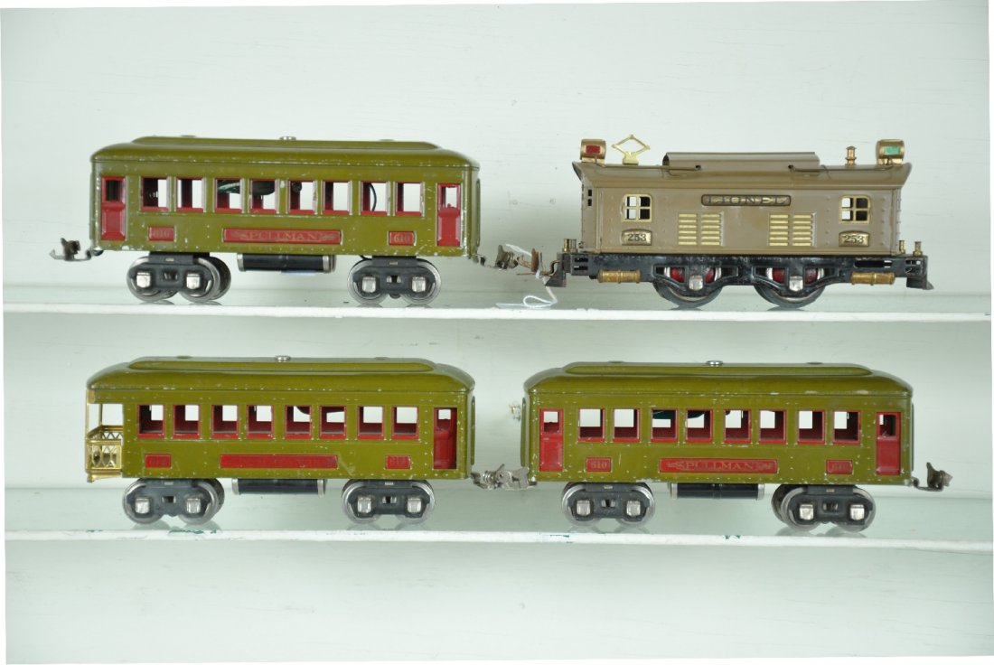 4Pc Lionel 253 Passenger Set: Includes a 253 boxcab electric, cab is a awesome restoration, wheels fatigued; 2 #610 olive Pullmans; matching 612 observation, cars missing window material. Otherwise clean, showing light to moderate