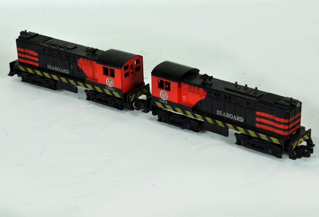 American Flyer 21918 & -1 Seaboard Baldwins: S Gauge. Clean AA diesels that headed the Hot Shot set. They both have hairline screw cracks, but all steps are intact. Graphics match nicely on both with bright shiny stickers all around. They show l