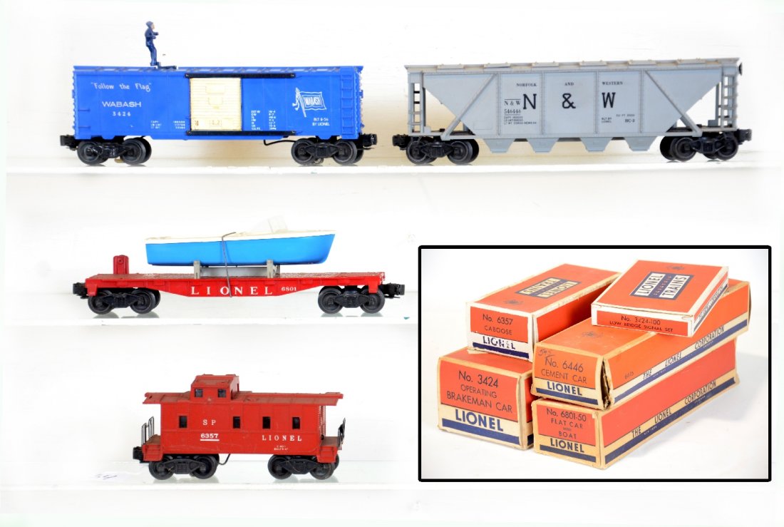 4 Boxed Lionel Freight Cars: Includes a 3424 Brakeman car. Blue man version with -100 telltale set; 6446 N&W cement car; 6801-50 flat with repro boat; 6357 caboose. All show light to moderate playwear, C6+-7+