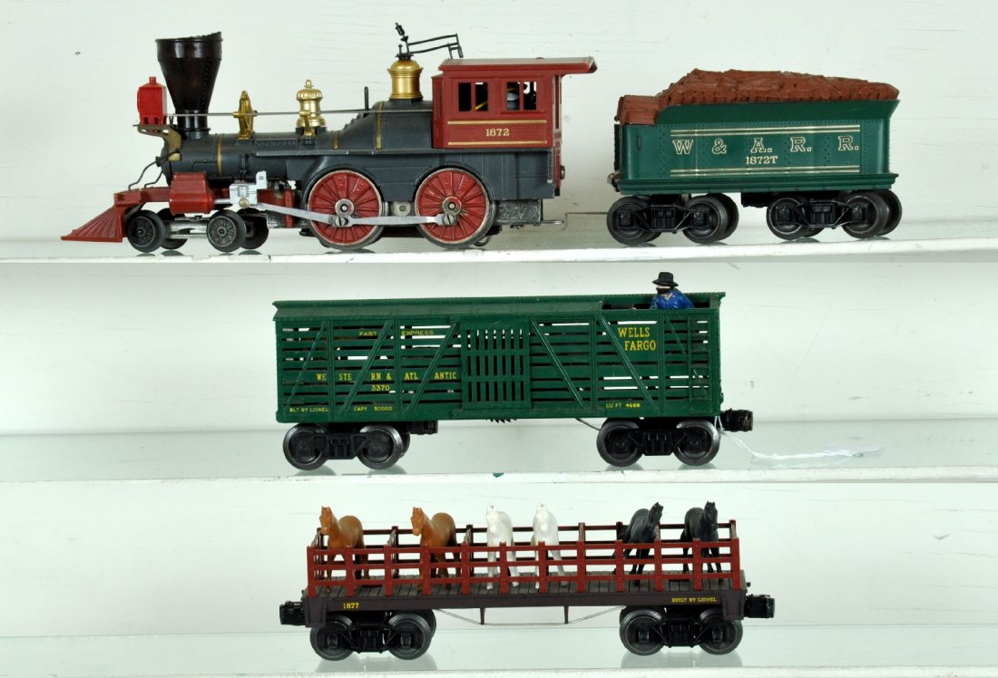 Partial Lionel General Set: Includes an 1872 General loco with smoke, trim is intact; 1872T tender; 3370 sheriff & outlaw car, cowboy touched up; 1877 flat with replaced horses. All show light to moderate playwear, C7