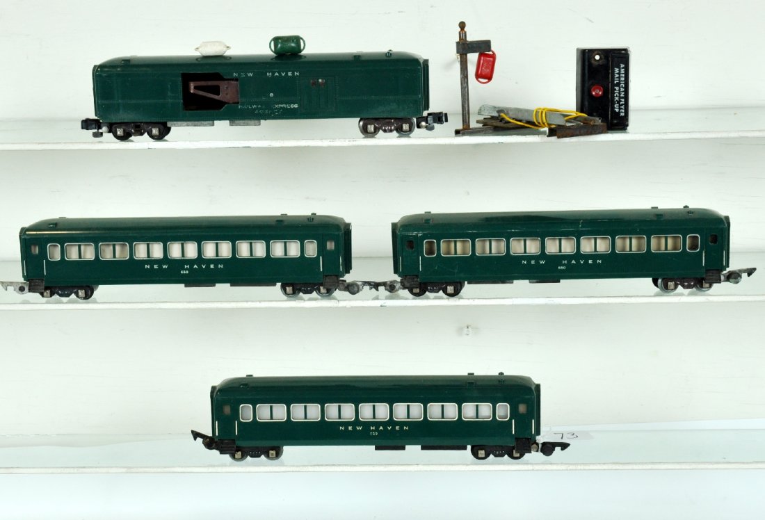 4 American Flyer Passenger Cars: S Gauge. Includes a 718 mail pick-up set, complete, number worn 1 side, activator has rust spots, conversion couplers; 3 #650 NH coaches. Otherwise all are clean, showing light to moderate playwear, C