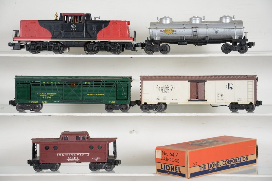 5Pc Lionel 625 Diesel Freight Set: Includes a 625 LV 44 ton diesel; 6415 Sunoco tank car; 3356 horse car only; 3662-1 milk car, only; boxed 6417 PRR N5c caboose. All show light to moderate playwear, C6-7