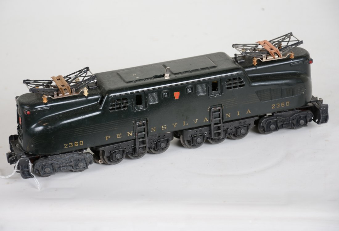 Lionel 2360 GG1 Electric: Dual motor GGI with 100% decals. The stripes are 20% at best and body shows moderate playwear, C6