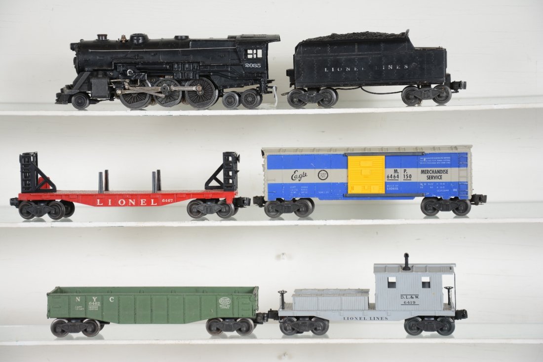 6Pc Lionel 2035 Steam Freight Set: Includes a 2035 steam loco, clean with bright rods; 6466WX tender, replaced shell screws, C5; 6467 flat car; 6464-150 MP boxcar, type IIB, small Eagle, C6; 6462-25 gondola; 6419 work caboose. Otherwis