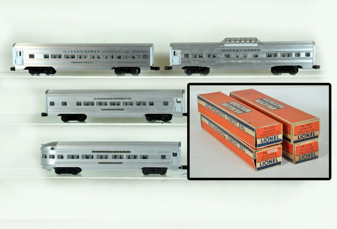 Nice Boxed Lionel Flat Chanel Cars: 1957 production, last of the non-striped cars. Includes a 2532 silver Range vista-dome; 2533 Silver Cloud Pullman; 2534 Silver Bluff Pullman; 2531 Silver Dawn observation. All adhesive plates in flat 