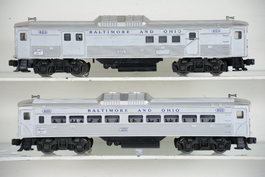 Lionel 400 & 404 Budd Diesels: Includes a 404 powered RDC-4 baggage, clean battery box, showing moderate playwear, C5; 400 Powered RDC-1 Coach, clean battery box, showing light to moderate playwear, C7