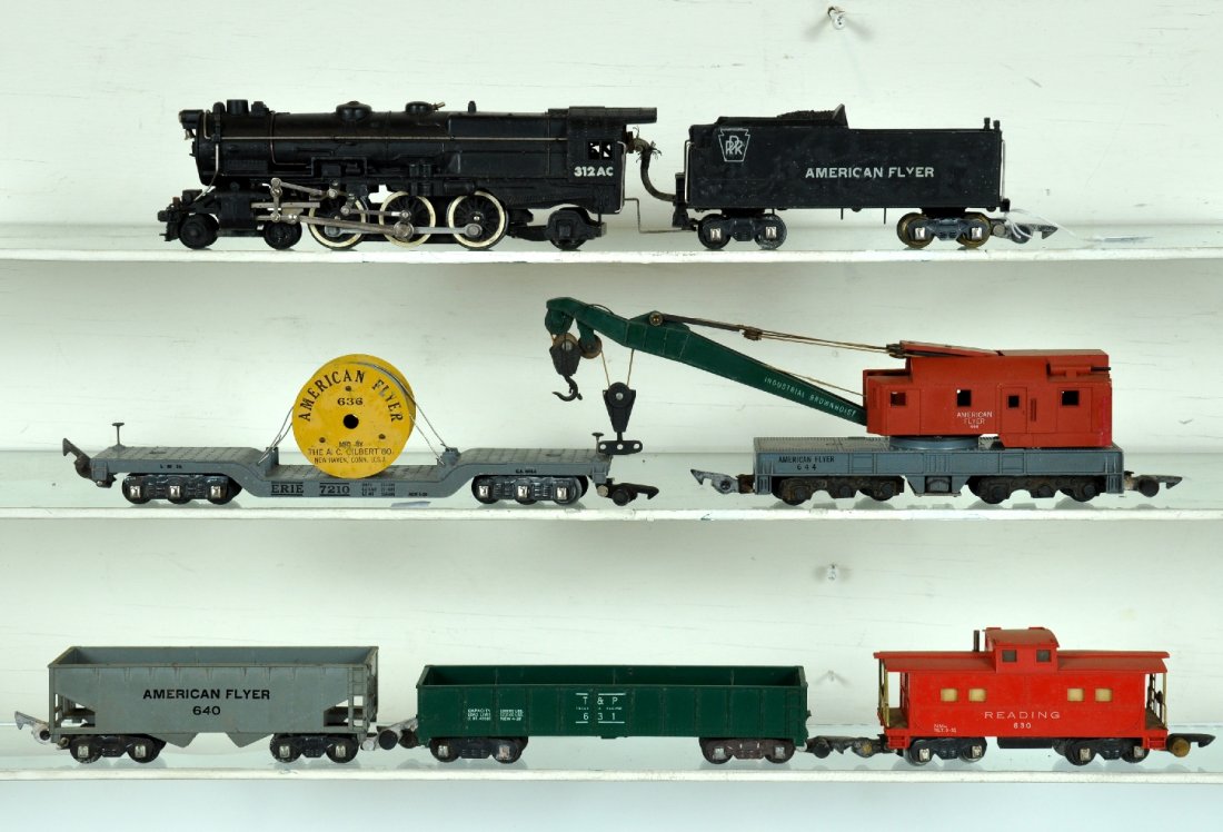 6Pc American Flyer 312AC Steam Freight Set: S Gauge. Includes a 312AC PRR K4 locomotive, missing 1 small front step, but has bright lettering & rods; 636 Reel car; 631 T&P gondola; 644 crane, restrung with light oxidation spots on metal pulley 