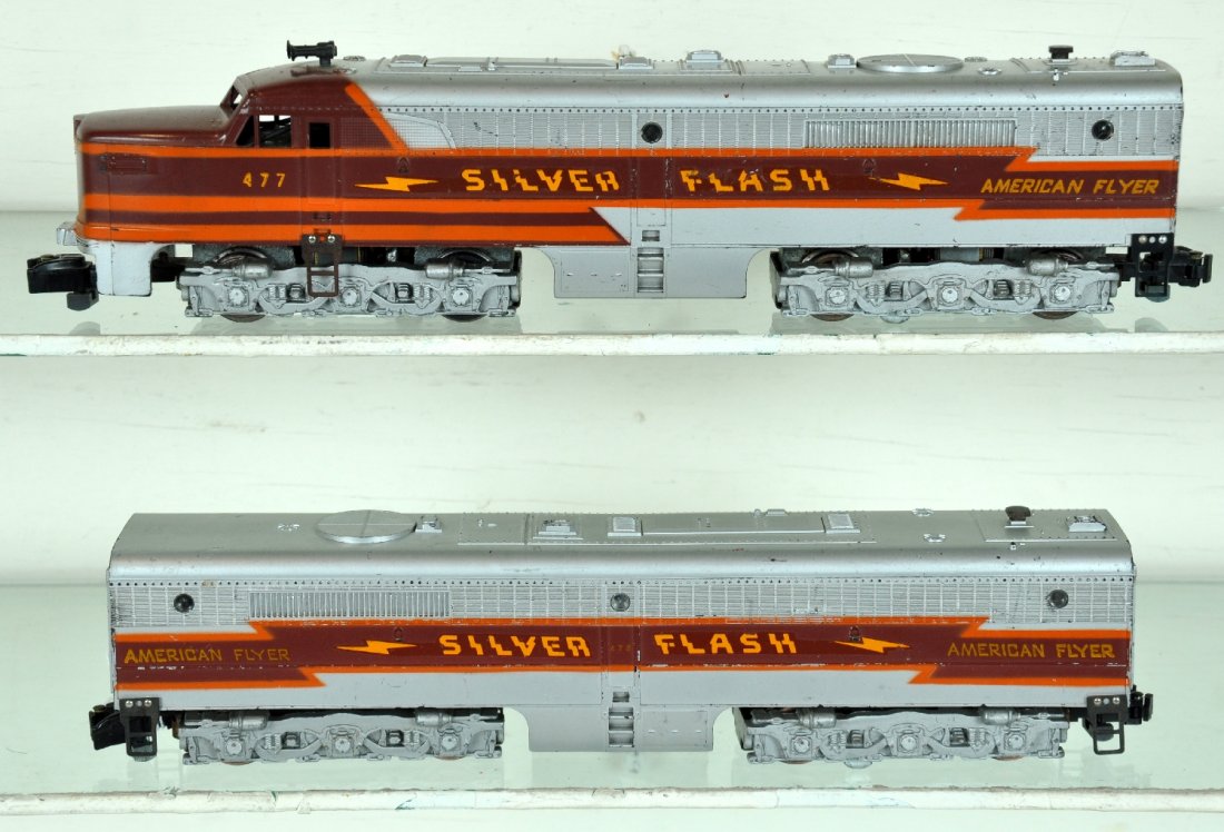 American Flyer 477 & 478 Silver Flash Diesels: S Gauge. Nice clean PA Alco AB diesels. They have 99% decals with matching graphics. The silver is fairly bright and they show light to moderate playwear, C7-7+