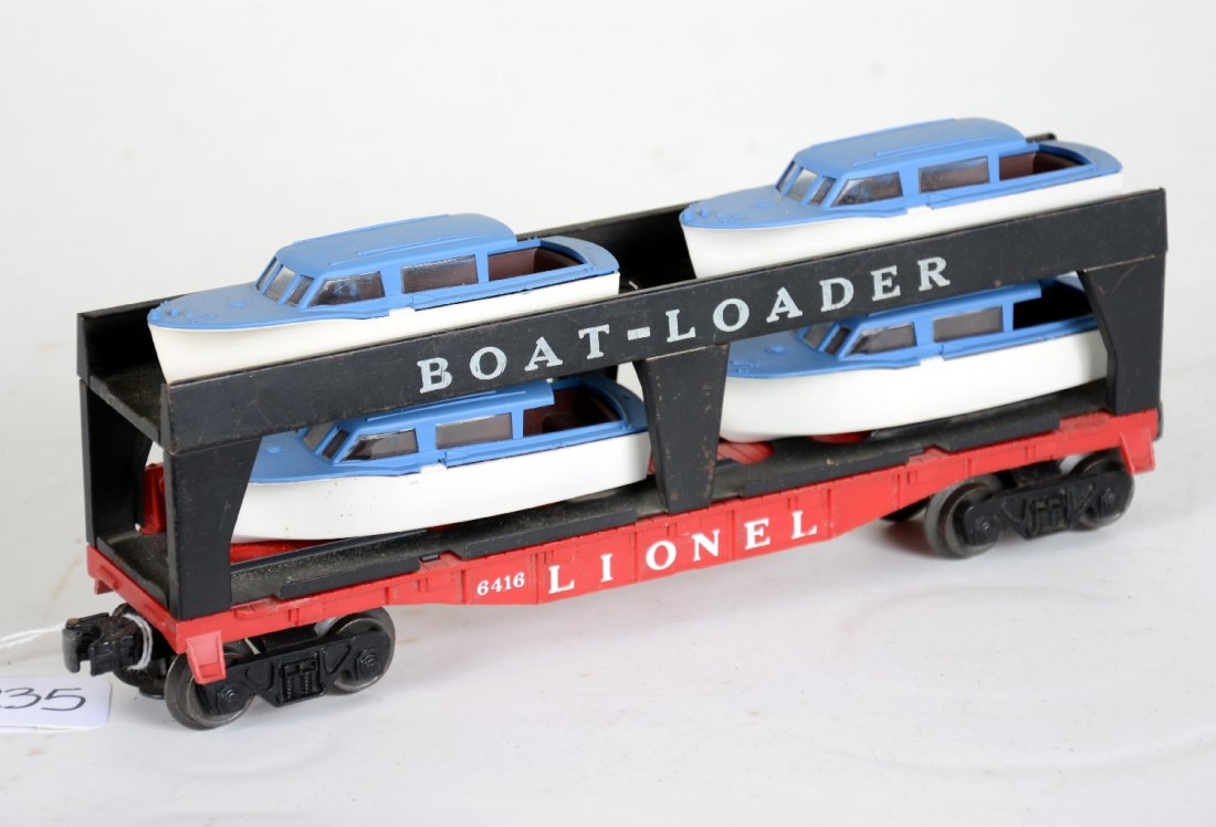 Clean Lionel 6416 Boat Loader: Nice flat with matte patina on uprights. The Athearn boats are original and intact. It shows light playwear, C8