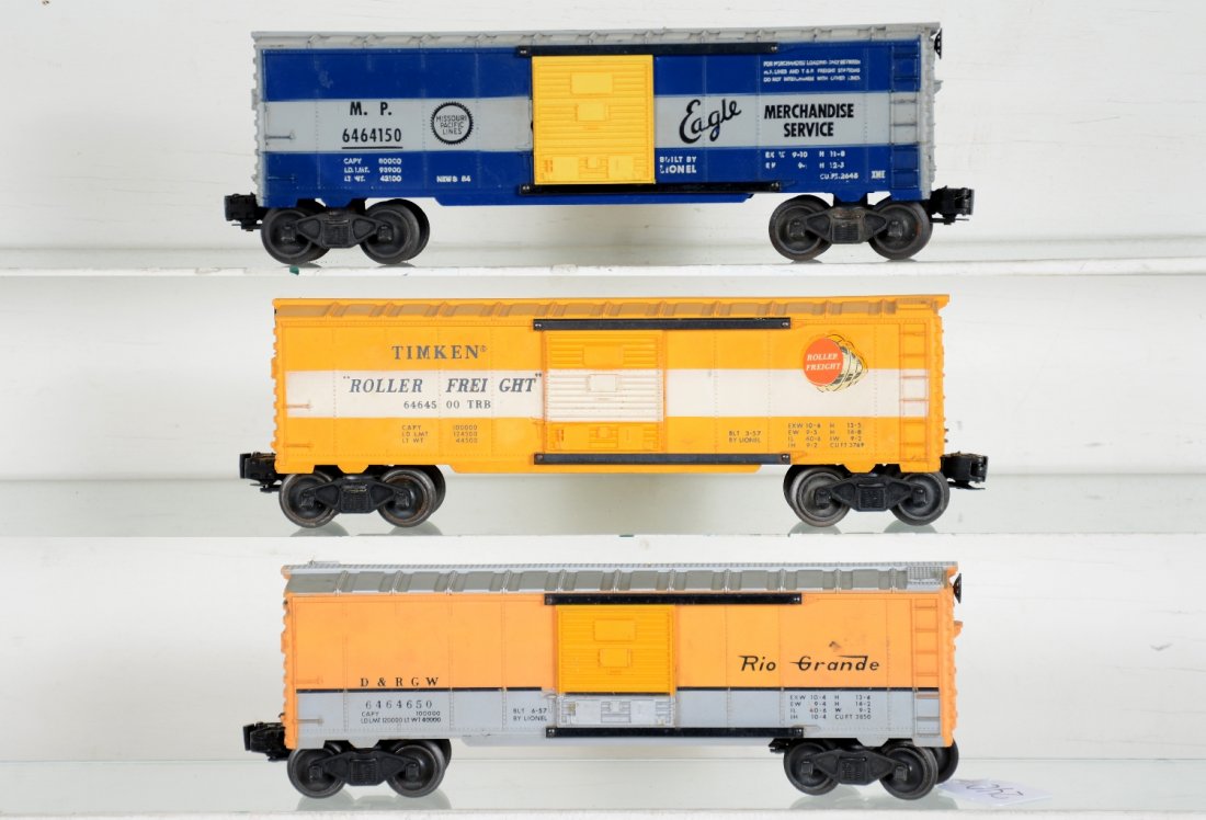 3 Lionel 6464 Boxcars: Includes a 6464-450 RG, type IIB with orange tint to body paint; 6464-500 Timken, type IIB with 1 decal 97%, other 100%; 6464-150 MP, type IIA, grooved, gray only painted on dark blue mold; large Eagl