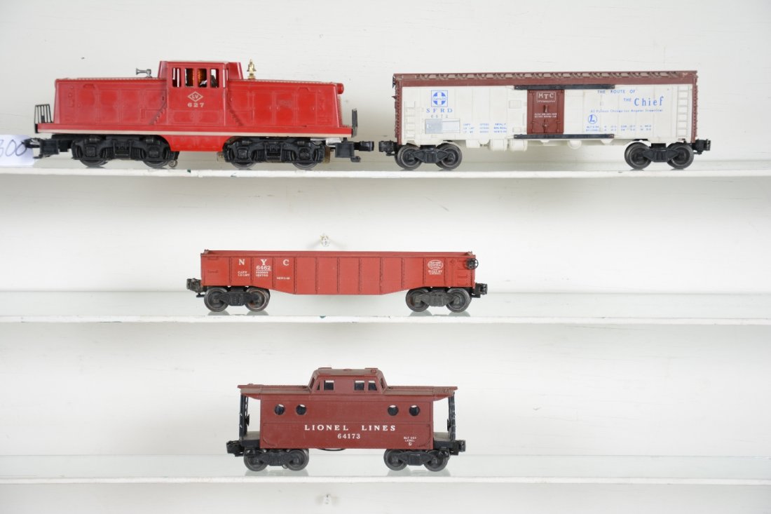 4Pc Lionel 627 Diesel Freight Set: Includes a 627 LV 44 ton diesel, hairline screw crack, but clean with nice stripe; 6672 SF reefer, C6; 6462 gondola; 6417-1 N5c Caboose. Rest show light playwear, C7+