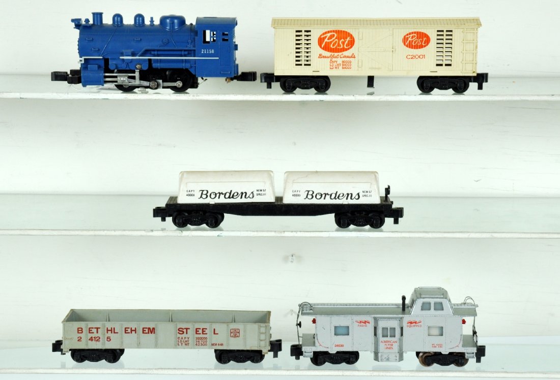 4Pc American Flyer 21158 Steam Freight Set: S Gauge. Includes a 21158 dockside switcher; 24575 Borden's tank flat; C2001 Post Cereals boxcar; 24125 Bethlehem steel gondola; 24636 baywindow caboose, has small chip in roof corner, C5+; otherwise 