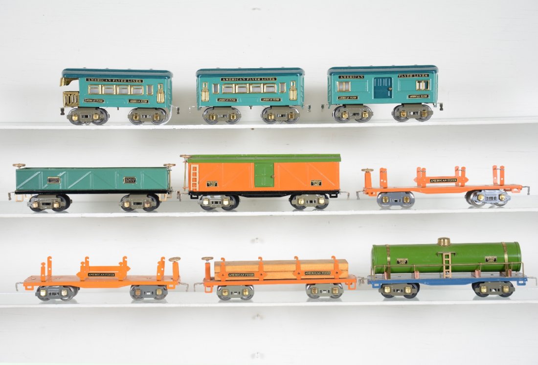 9 Nicely Restored American Flyer Cars: Includes 6 -3200 series 9" Freight cars and 3 bread box style cars, all professionally restored. Some shelf dust, otherwise appear C8-9