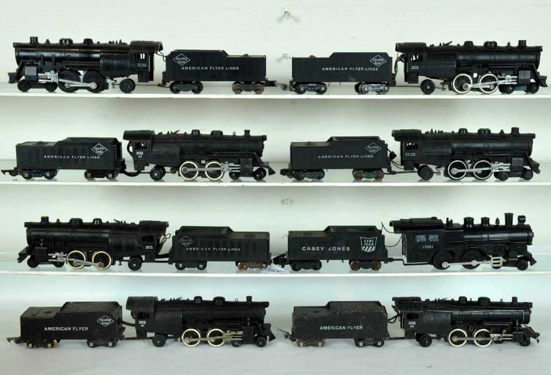 8 American Flyer Atlantic Locos: S Gauge. Includes 21105, 2 #302 & 2 #302AC, all with smoke & Choo-Choo, 1 302 missing small front step; 300AC; 21161; L2001 Casey Jones for the Game train. All show moderate playwear, C5-7
