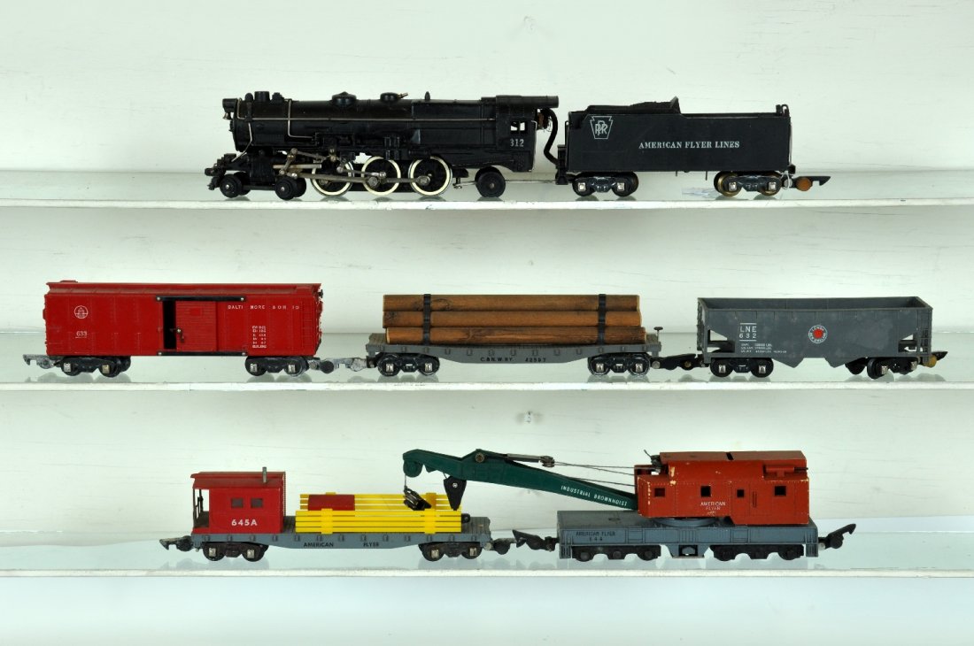 6Pc American Flyer 312 Freight Train: S Gauge. Includes a 312 PRR K-4 loco; 633 B&O boxcar; 632 LNE hopper; 628 log car, plastic frame; 644 crane, tuscan painted cab, C6; 645A boom tender, cab roof corner repaired, C5. Otherwise all show 