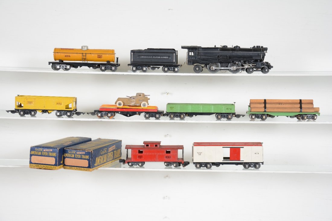 8Pc American Flyer 3/16 Freight Set: Includes a 545 4-4-2 steam loco with 417 tender; 480 Shell tank; 472 unloading car, top touched-up with original TootsieToy armored car; 476 gondola; 482 log car; 478 boxcar, C5; 486 hopper, ob; 484 c