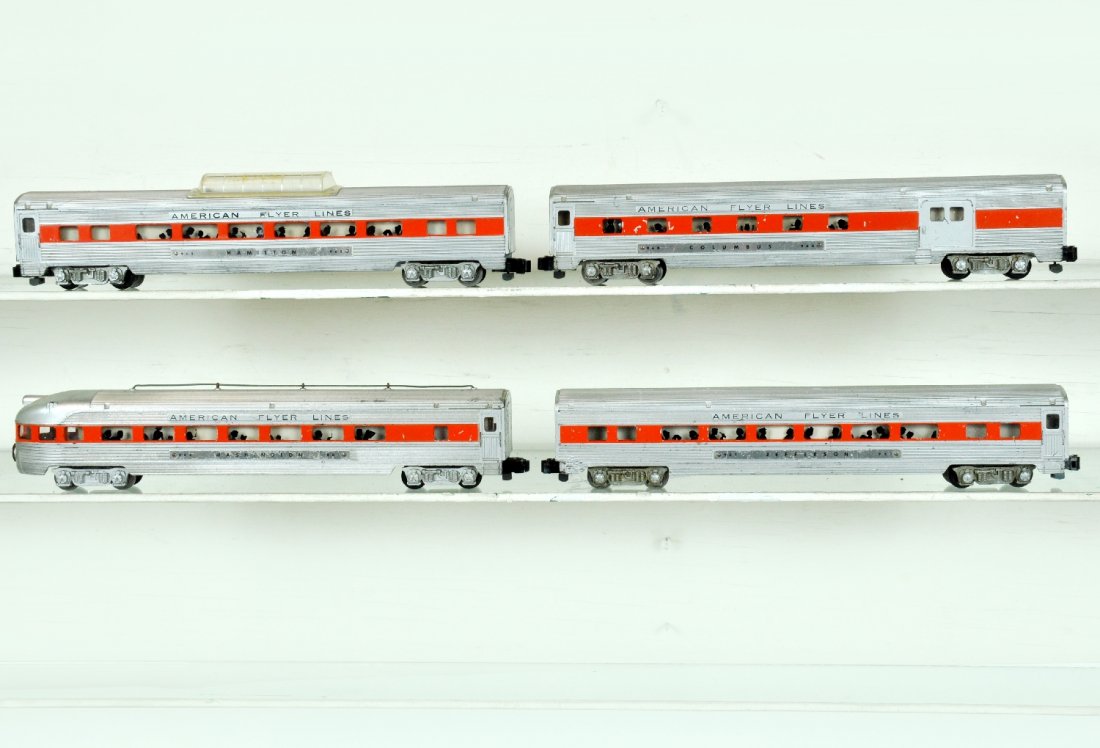 4 American Flyer New Haven Passenger Cars: S Gauge. Includes a 960 combine; 961 coach; 962 vista-dome; 963 observation with crudely repaired corner step. They have orange stripes and look great behind a 499 or 474/5 locos. They show moderate p
