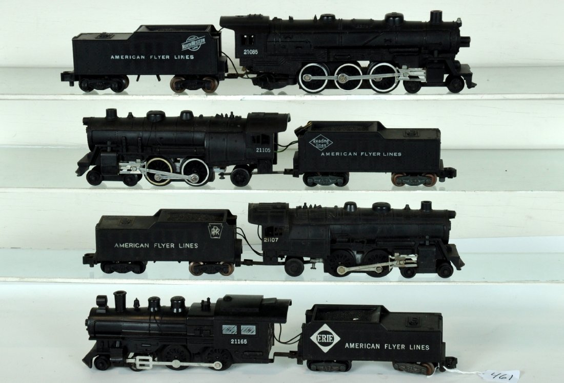 4 American Flyer Steam Locomotives: S Gauge. Includes a 21085 C&NW Pacific; 21105 Reading Atlantic; 21107 PRR Atlantic, missing 1 small front step, all 3 have smoke & Choo-Choo; 21165 Erie Casey Jones. They show light to moderate playwe