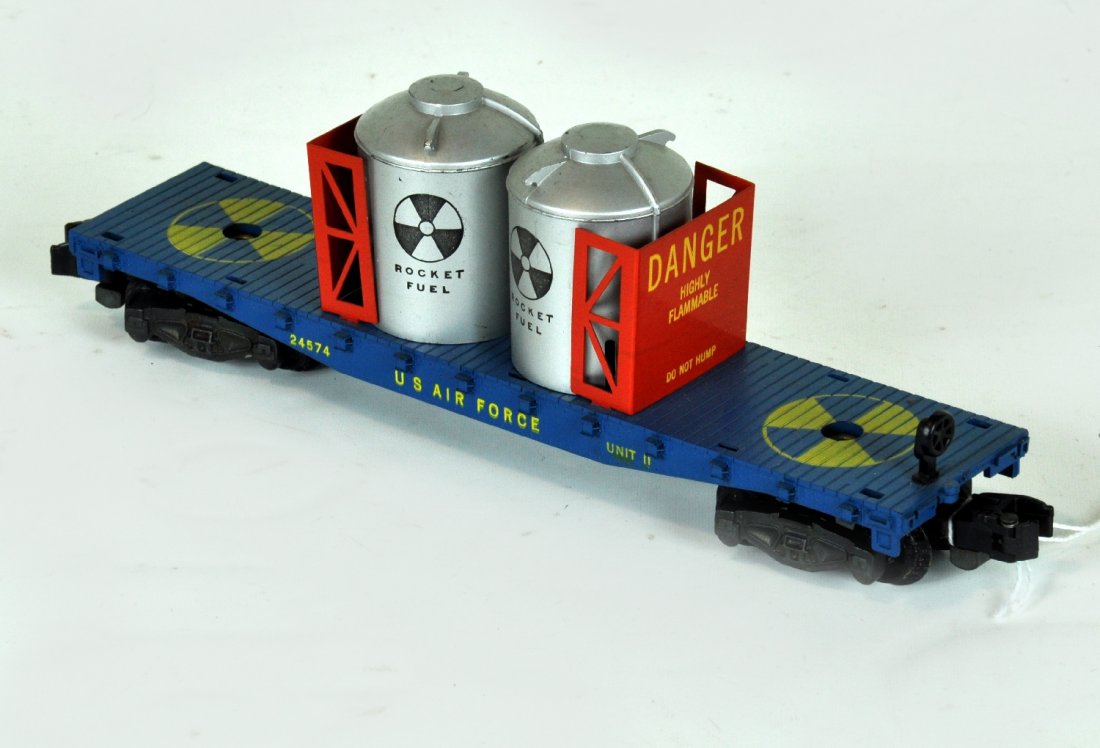 Clean American Flyer 24574 USAF Flat: S Gauge. Clean rocket fuel flat with bulkheads. It is clean with an intact brake wheel, C8