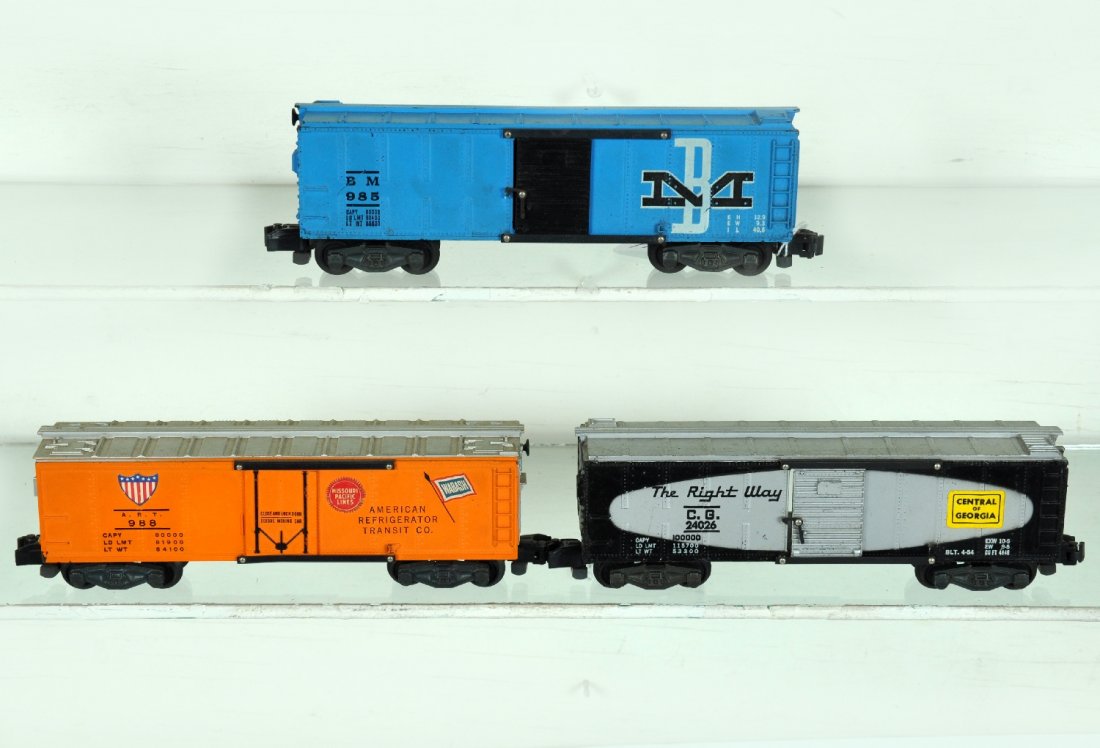 American Flyer 988, 985 & 24026 Freights: S Gauge. Includes a 988 ART reefer, C7+; 985 B&M boxcar, small chip in catwalk end, otherwise C7; 24026 C of G boxcar, missing 1 coupler nib, nice stickers, C6