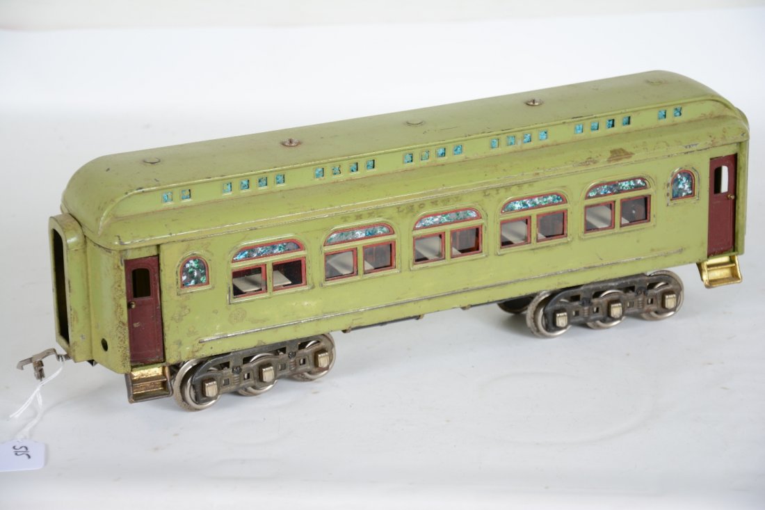 Lionel 431 Diner: Standard Gauge. Early version with maroon trim. Over-cleaning has left only partial top lettering on sides. It shows moderate playwear, C5