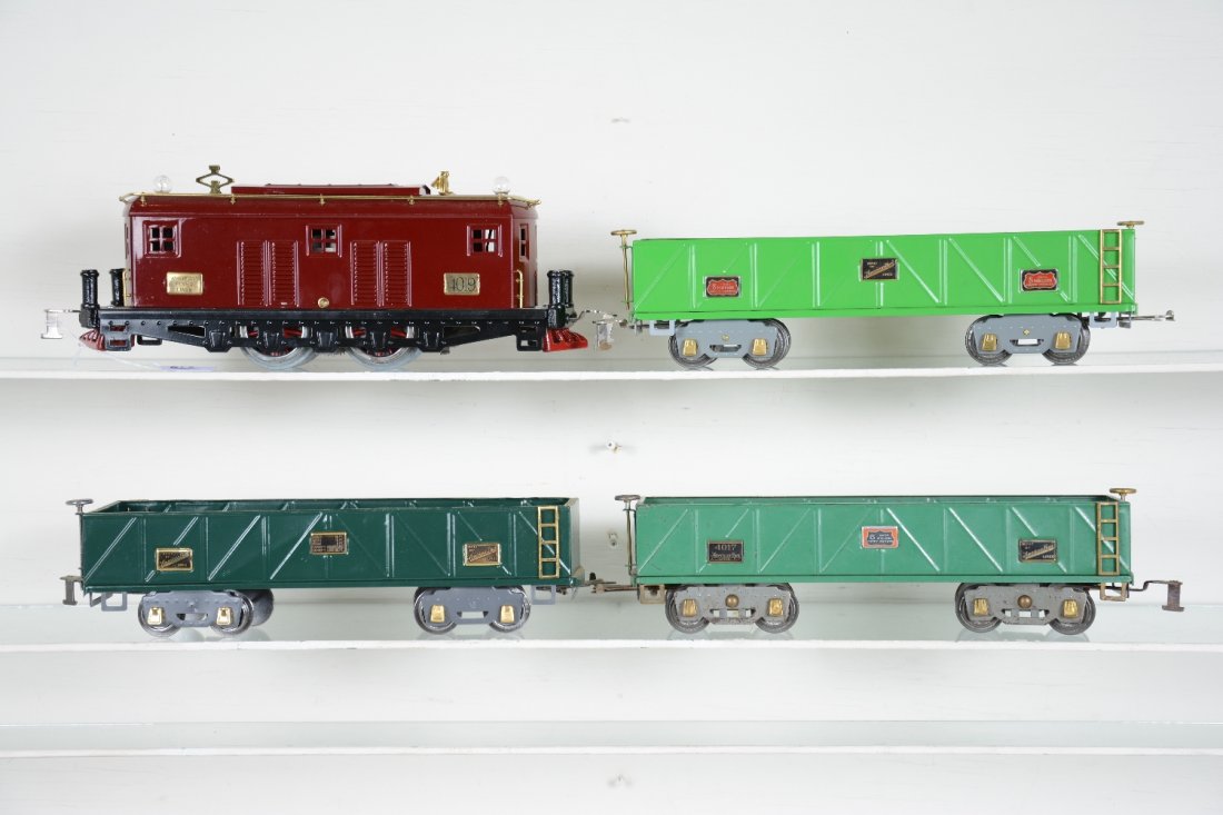 American Flyer Freight Train: Standard gauge. Includes a professionally restored 4000 boxcab electric with 2 restored 4012 sand cars, plus a C6 original 4012.
