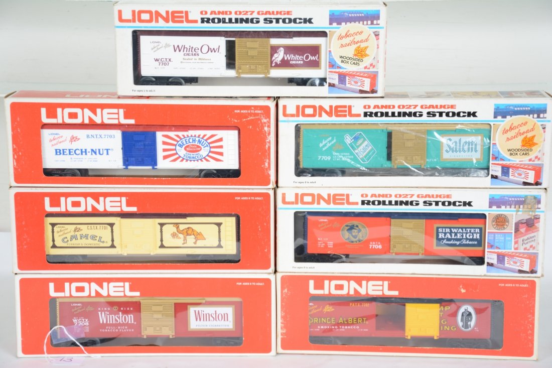 7 Boxed Lionel Tobacco Cars: Includes 7708 Winston; 7701 Camel; 7702 Prince Albert; 7703 Beechnut; 7706 Sr Walter Raleigh; 7707 White Owl; 7709 Salem. All appear unrun with clean boxes, C10