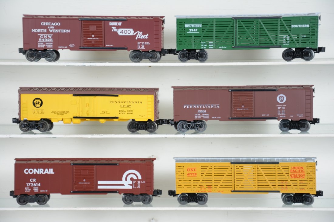 6 Boxed KMT Freight Cars: Includes UP stock car; Conrail boxcar; PRR boxcar; PRR reefer; Southern stock car; C&NW boxcar. All appear unrun with boxes, C10