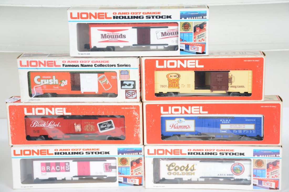 7 Lionel Freight Cars, Beer Cars: Includes reefers- 9871 Carlings; 9866 Coors; 9862 Hamm's; 9816 Brach's; Boxcars- 7801 A&W; 7810 Orange Crush; 9886 Mounds Candy. They appear unrun with boxes, C10