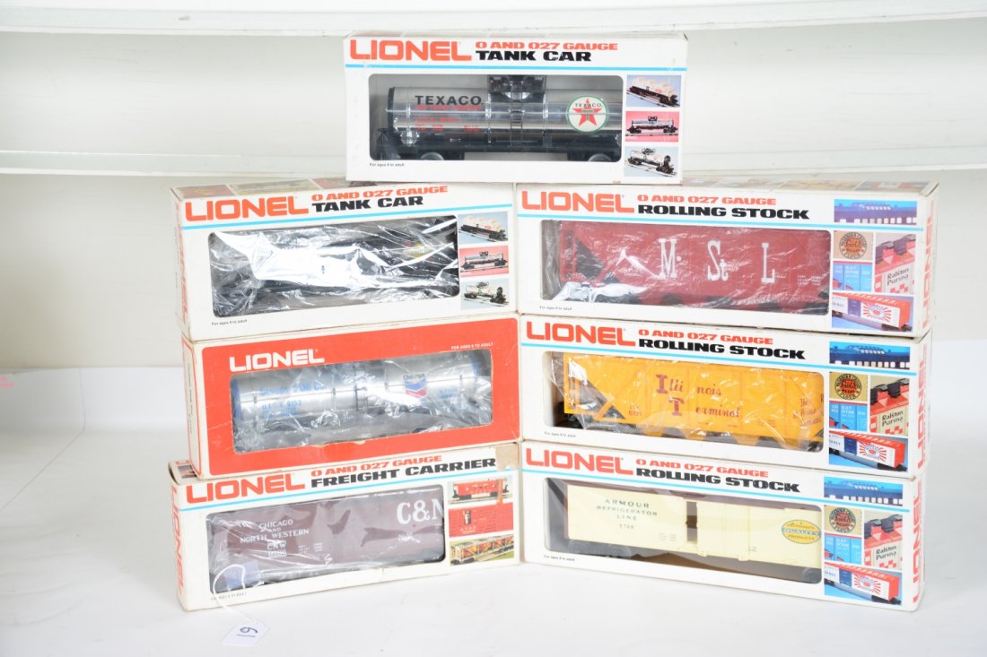 7 Boxed Lionel Freight Cars: Includes 9153 Chevron tank; 9786 C&NW boxcar, ob over written; 9147 Texaco tank; 9138 Sunoco tank; 5708 Amour reefer; 9213 M&StL hopper; 6131 Illinois Terminal hopper. All appear unrun with boxes, C10
