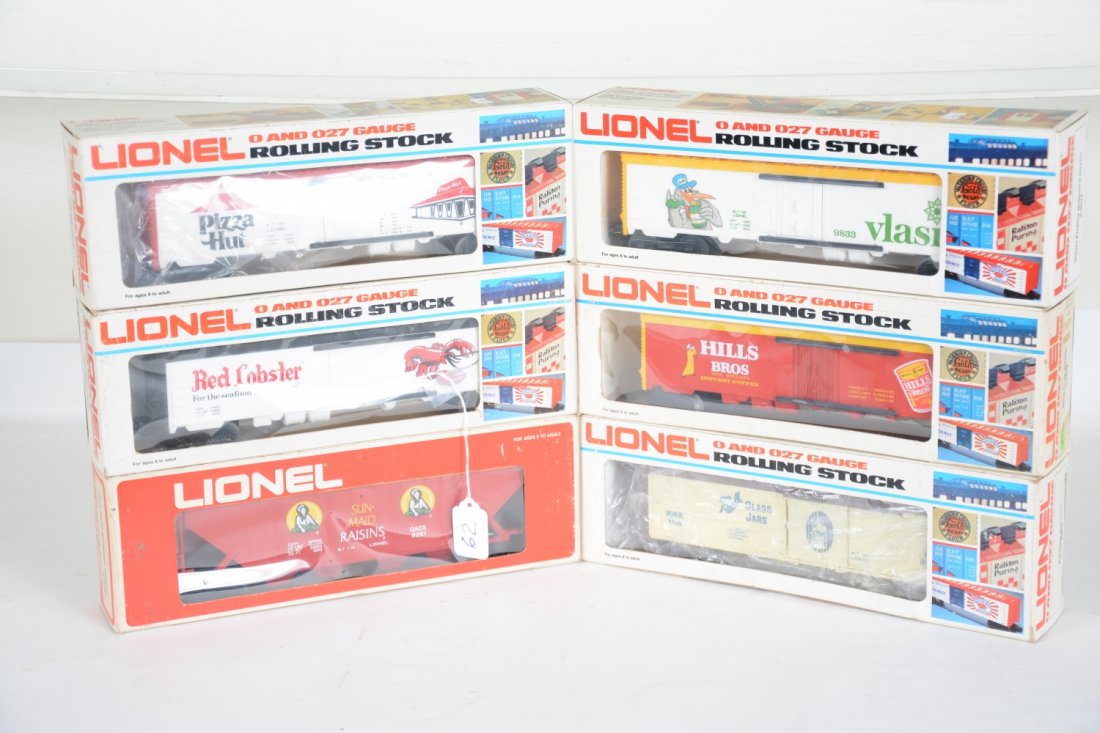 6 Boxed Lionel Freight Cars: Includes 9261 Sun Maid hopper; 7510 Red Lobster reefer; 7511 Pizza Hut reefer; 5705 Ball Glass reefer; 9833 Vlasic reefer; 9879 Hill's reefer. All appear unrun with boxes, C10
